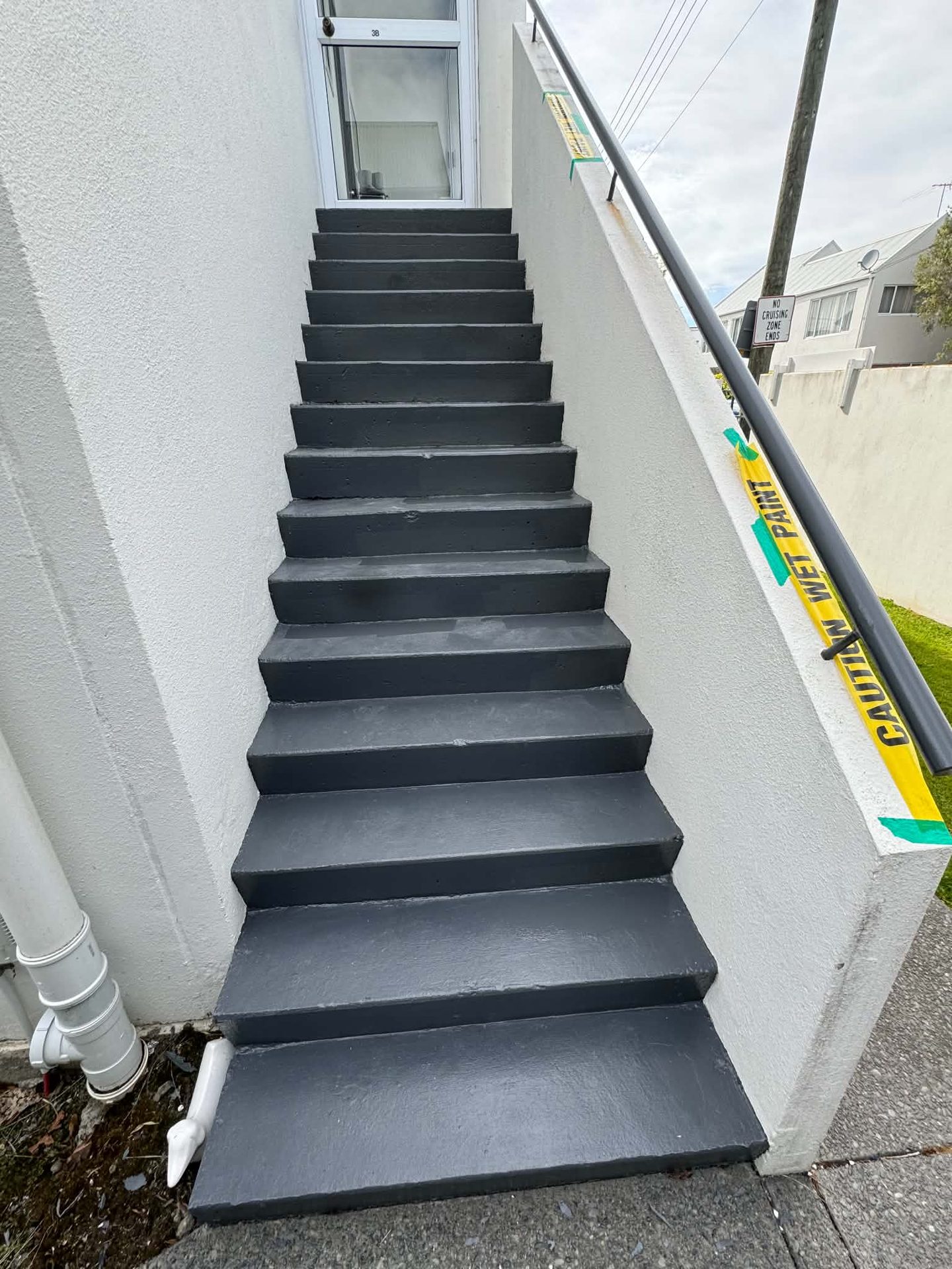 Protective coating on exterior stairwell, Christchurch