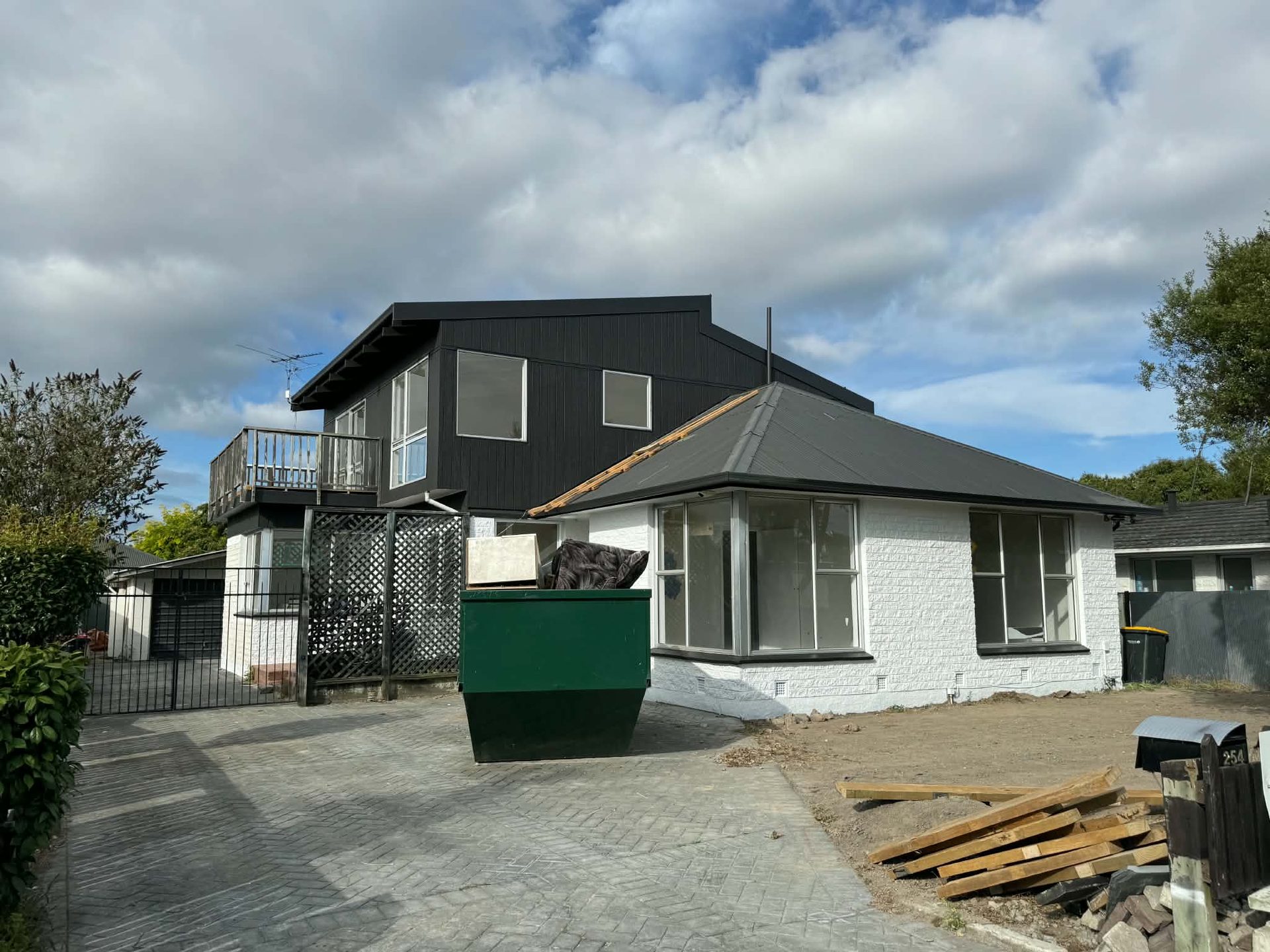 Two-storey exterior repaint in graphite, Christchurch